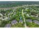 Aerial view of property nestled in a lush community with mature trees and waterways at 1787 Tennyson Row # 9, Mount Pleasant, SC 29466
