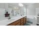Spacious bathroom featuring double sinks, soaking tub and a glass-enclosed shower at 1787 Tennyson Row # 9, Mount Pleasant, SC 29466