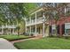 Inviting two-story home with double porches, brick walkway, and manicured landscaping at 1787 Tennyson Row # 9, Mount Pleasant, SC 29466