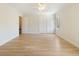 Spacious bedroom featuring hardwood floors, a closet, and natural light at 19 Ashley Ave, Charleston, SC 29401