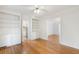 Bright dining area featuring hardwood floors and built-in cabinets and shelving at 19 Ashley Ave, Charleston, SC 29401