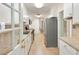 Updated kitchen featuring white cabinets, stainless steel appliances, and tiled countertops at 19 Ashley Ave, Charleston, SC 29401