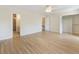 Large main bedroom with hardwood floors, a closet, and an attached bathroom at 19 Ashley Ave, Charleston, SC 29401
