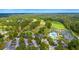 Aerial view of the golf course, tennis court and swimming pool at Pine Forest Country Club at 203 Yeamans Way, Summerville, SC 29483