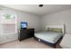 Bedroom with a bed, dresser and window at 203 Yeamans Way, Summerville, SC 29483