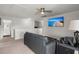 Loft area with ceiling fan and entertainment center, with television and lamps at 203 Yeamans Way, Summerville, SC 29483