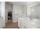 The main bathroom features a shower and toilet room, large mirror, and walk-in closet at 203 Yeamans Way, Summerville, SC 29483