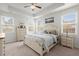 Bright main bedroom with a decorative tray ceiling and a lovely furniture set at 203 Yeamans Way, Summerville, SC 29483