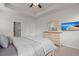 Bright main bedroom with a modern ceiling fan and an entertainment center with TV at 203 Yeamans Way, Summerville, SC 29483
