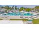 Beautiful community pool with lounge chairs and seating areas, perfect for relaxation and recreation at 203 Yeamans Way, Summerville, SC 29483