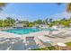 Inviting community pool area with lounge chairs and seating, a great place to relax and enjoy the sunshine at 203 Yeamans Way, Summerville, SC 29483