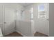 Shower stall with glass door and neutral tile; a bright window adds natural light at 203 Yeamans Way, Summerville, SC 29483