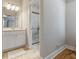 Clean bathroom featuring a vanity with marble countertop and walk-in shower at 204 Read St, Moncks Corner, SC 29461