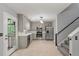 Bright kitchen features stainless appliances, modern countertops, stylish cabinetry and a door leading to the outdoor space at 209 Lipman St, Summerville, SC 29483