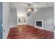 Spacious living room features a cozy fireplace, hardwood floors, and an open layout at 209 Lipman St, Summerville, SC 29483