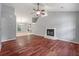 Spacious living room features a cozy fireplace, hardwood floors, and an open layout at 209 Lipman St, Summerville, SC 29483