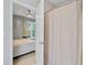 Ensuite bathroom including a shower and view into a bedroom at 2121 Egret Crest Ln, Charleston, SC 29414