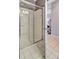 Walk in shower features glass doors and white tiled surround at 2121 Egret Crest Ln, Charleston, SC 29414
