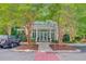 Community clubhouse with symmetrical facade, lush landscaping and nearby parking at 2121 Egret Crest Ln, Charleston, SC 29414