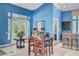Clubhouse interior with dining area, bar, and natural light at 2121 Egret Crest Ln, Charleston, SC 29414