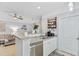 Open concept kitchen with seating bar and a stainless steel dishwasher appliance at 2121 Egret Crest Ln, Charleston, SC 29414
