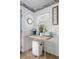 Charming coffee bar including a countertop, kettle, coffee maker, toaster, and trash receptacle, with lighthouse wallpaper at 2128 Golfview Dr, Charleston, SC 29412