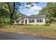 Charming single-story home featuring a welcoming facade and well-maintained landscaping, exuding curb appeal at 2128 Golfview Dr, Charleston, SC 29412