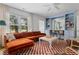 Inviting living room with a sectional sofa, built-in bar, and ample natural light at 2128 Golfview Dr, Charleston, SC 29412