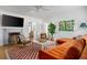 Cozy living room showcasing a fireplace, comfortable seating, and an open layout at 2128 Golfview Dr, Charleston, SC 29412