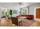 Bright living room featuring hardwood floors, stylish furniture, and a cozy atmosphere at 2128 Golfview Dr, Charleston, SC 29412