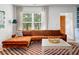 Comfortable living space with a plush sofa, large window, and cozy decor at 2128 Golfview Dr, Charleston, SC 29412