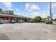A spacious parking lot adjacent to commercial property with available parking spaces for customers at 2128 Golfview Dr, Charleston, SC 29412