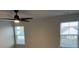 Bedroom filled with natural light showcases a ceiling fan at 244 Tuscan Sun St, Summerville, SC 29485