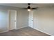 Spacious, neutral bedroom features two closets and plush carpet at 244 Tuscan Sun St, Summerville, SC 29485