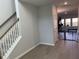 Bright, neutral hallway leads to light-filled rooms in a modern home at 244 Tuscan Sun St, Summerville, SC 29485