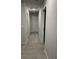 Hallway with carpet floor with multiple doors and light gray paint at 244 Tuscan Sun St, Summerville, SC 29485
