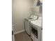 Convenient laundry room features modern appliances and tile flooring at 244 Tuscan Sun St, Summerville, SC 29485