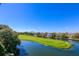 Beautiful aerial view of a golf course, homes and waterways at 25 Ocean Point Dr, Isle of Palms, SC 29451