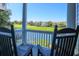 Relaxing balcony view overlooking a pond, golf course, and neighborhood homes at 25 Ocean Point Dr, Isle of Palms, SC 29451