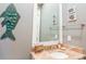 Bathroom featuring a coral marble countertop, decorative fish, and silver bathroom hardware at 25 Ocean Point Dr, Isle of Palms, SC 29451