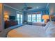 Spacious bedroom with a dresser and a view of the backyard at 25 Ocean Point Dr, Isle of Palms, SC 29451