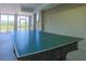 Indoor game room with a ping pong table at 25 Ocean Point Dr, Isle of Palms, SC 29451