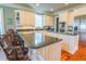 Spacious kitchen with stainless steel appliances and a center island at 25 Ocean Point Dr, Isle of Palms, SC 29451