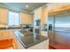 Modern kitchen with stainless steel appliances and a central island at 25 Ocean Point Dr, Isle of Palms, SC 29451