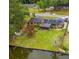 Home featuring a peaceful backyard, waterfront access, lush landscaping, and a screened-in porch at 2864 Wofford Rd, Charleston, SC 29414