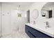 Bright bathroom with modern fixtures, dual vanity, and tile floors at 2864 Wofford Rd, Charleston, SC 29414