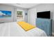 Bright bedroom with closet space and stylish light blue dresser at 2864 Wofford Rd, Charleston, SC 29414