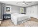 Bright bedroom with hardwood floors, stylish furniture, and closet at 2864 Wofford Rd, Charleston, SC 29414