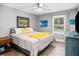 Bright bedroom with stylish decor, hardwood floors, and a large window at 2864 Wofford Rd, Charleston, SC 29414