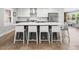 Modern kitchen with a large island, stainless steel appliances, and white and gray cabinetry at 2864 Wofford Rd, Charleston, SC 29414